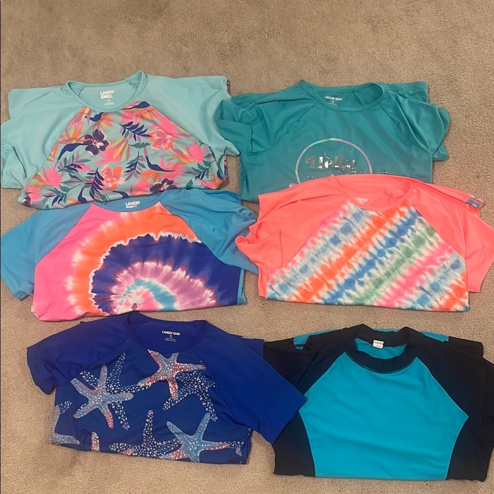 Lot of 6 short sleeve rash guards